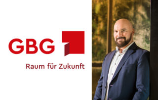 Das Foto zeigt Markus Abegg von der GBG Mannheim sowie deren Logo.